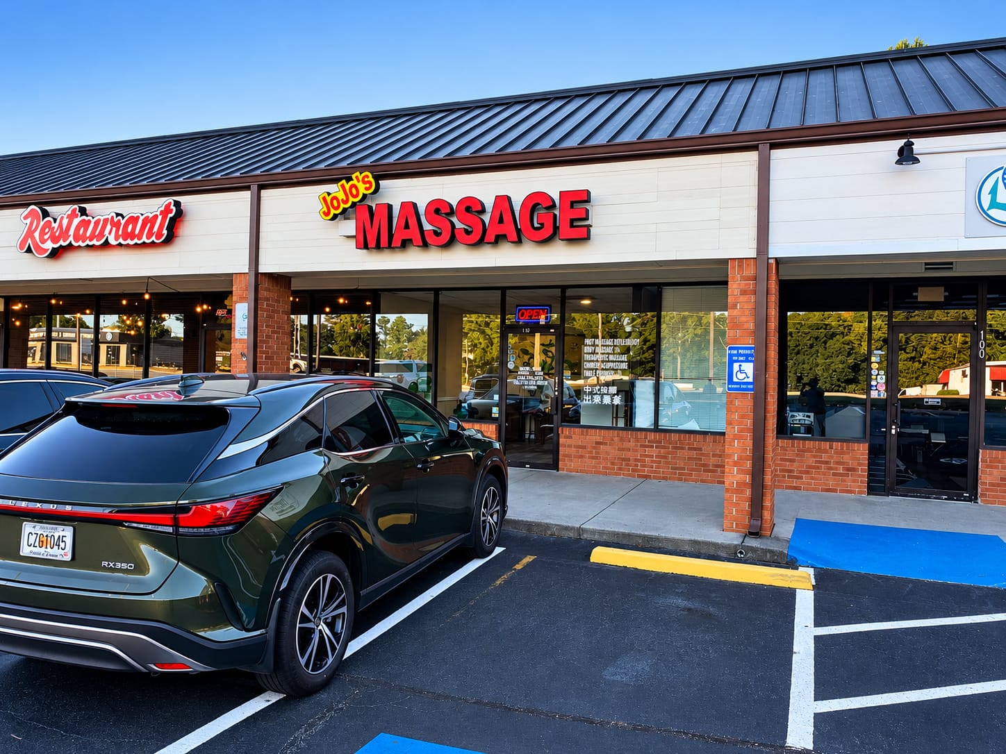 Jojo's Massage storefront exterior on 9550 Main St Woodstock GA